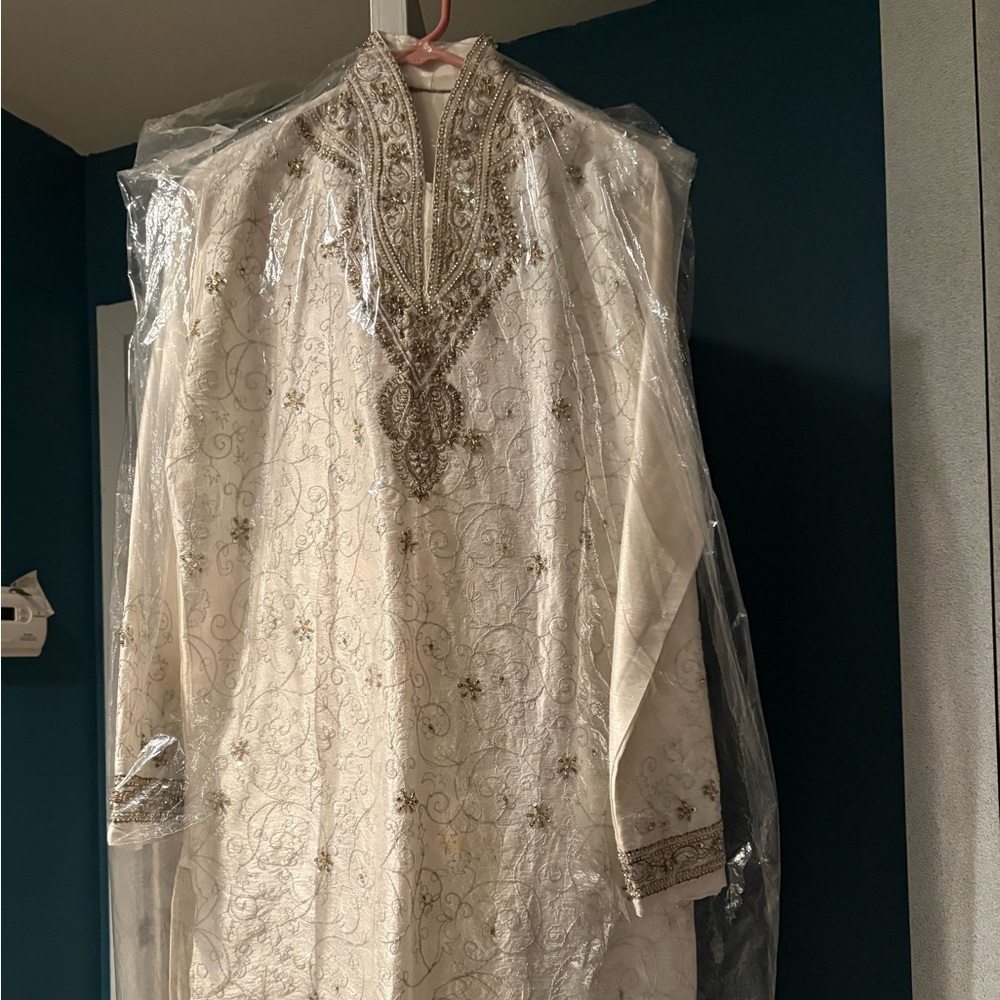 Lightly worn off white pure silk Indian outfit for men